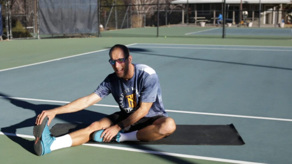 Sitting hamstring tennis stretch