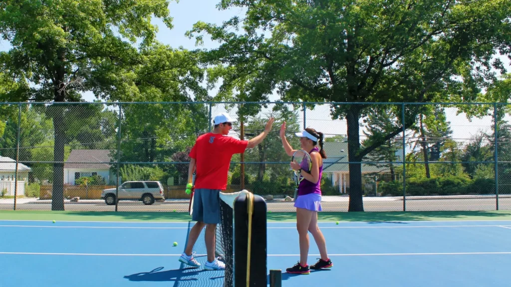 tennis coach giving lesson in Reno